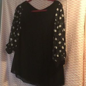 Black blouse with polka dot sleeves